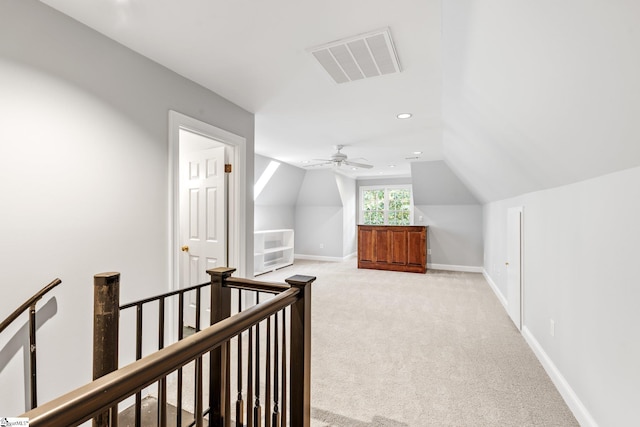 8 Atchison Way, Simpsonville, SC 29680 - bonus room with light carpet, vaulted ceiling, visible vents, baseboards, and ceiling fan
