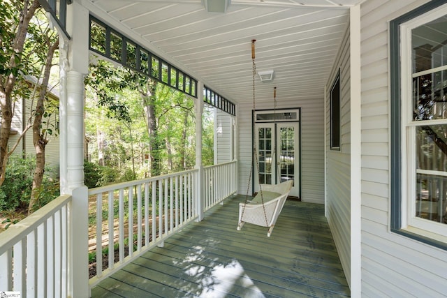 8 Atchison Way, Simpsonville, SC 29680 - wooden deck featuring covered porch