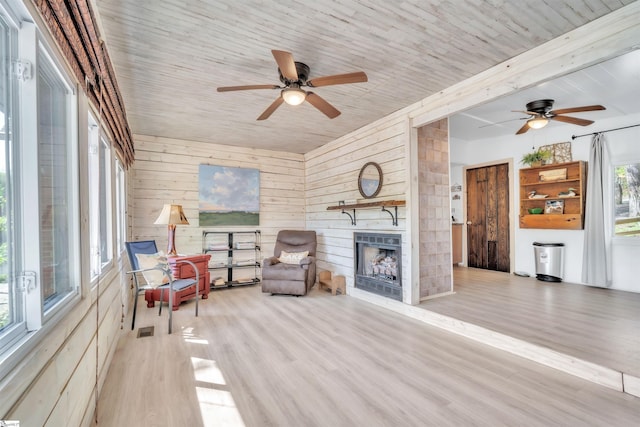 1506 W Lakeshore Dr, Landrum, SC 29356 - interior space featuring wood walls, a ceiling fan, and wood finished floors