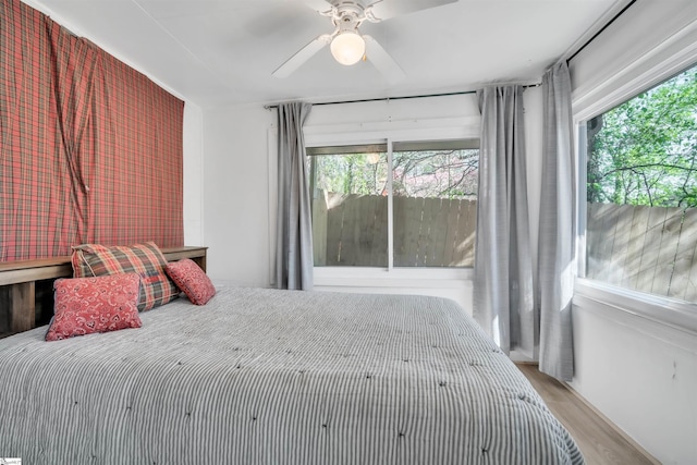 1506 W Lakeshore Dr, Landrum, SC 29356 - bedroom featuring wood finished floors and a ceiling fan