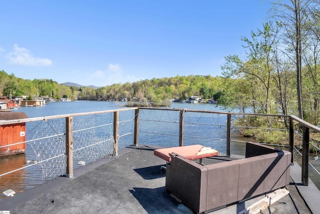1506 W Lakeshore Dr, Landrum, SC 29356 - exterior space featuring a water and mountain view, a wooded view, and a balcony