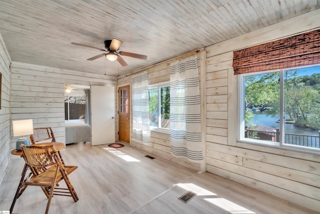 1506 W Lakeshore Dr, Landrum, SC 29356 - unfurnished room featuring ceiling fan, wood walls, and visible vents