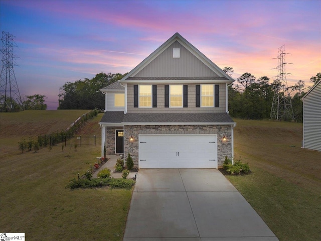 633 Morning Meadows Dr, Inman, SC 29349 - traditional-style home with an attached garage, a front lawn, driveway, and stone siding