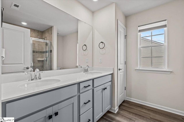 633 Morning Meadows Dr, Inman, SC 29349 - full bath featuring a shower stall, wood finished floors, baseboards, and a sink