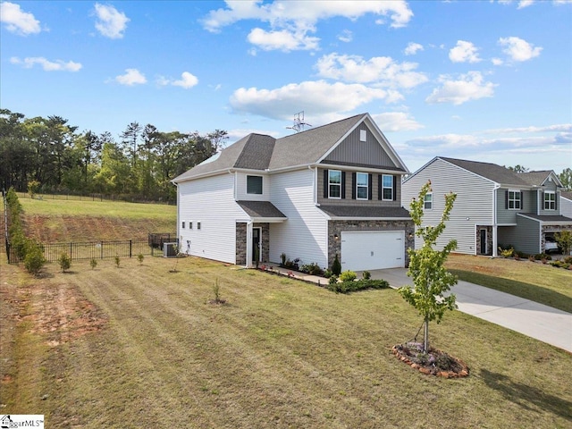 633 Morning Meadows Dr, Inman, SC 29349 - traditional-style house featuring a front lawn, stone siding, concrete driveway, fence, and a garage