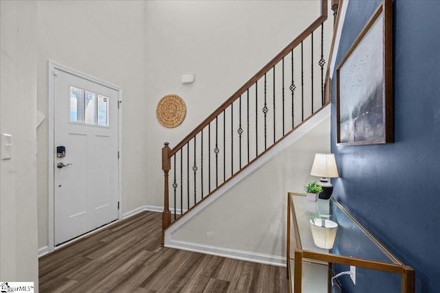 633 Morning Meadows Dr, Inman, SC 29349 - entrance foyer featuring wood finished floors, a high ceiling, baseboards, and stairway