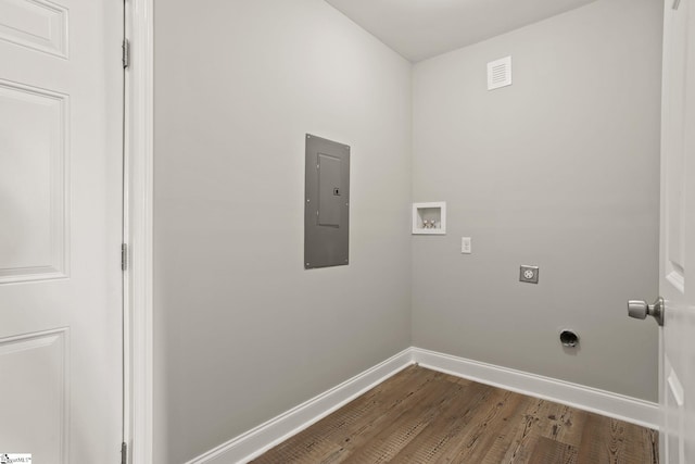 laundry area with wood finished floors, hookup for a washing machine, hookup for an electric dryer, baseboards, and laundry area