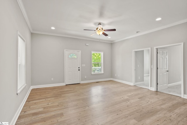 interior space featuring ceiling fan, crown molding, light wood-type flooring, and recessed lighting