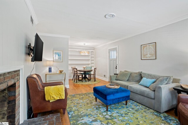 210 Keith Dr, Greenville, SC 29607 - living room with baseboards, crown molding, wood finished floors, and a fireplace