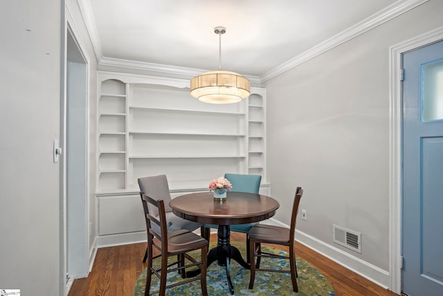 210 Keith Dr, Greenville, SC 29607 - dining area with visible vents, crown molding, baseboards, and dark wood-style flooring