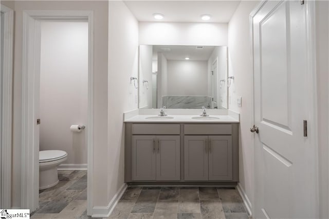 136 Light Spring Rd, Easley, SC 29642 - full bathroom featuring baseboards, stone tile flooring, and a sink