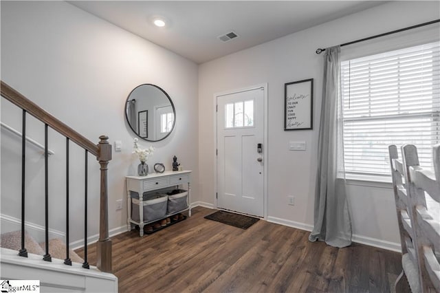136 Light Spring Rd, Easley, SC 29642 - entrance foyer featuring visible vents, stairs, dark wood-style flooring, and plenty of natural light