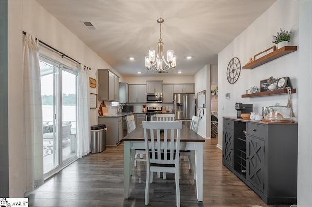 136 Light Spring Rd, Easley, SC 29642 - dining space with visible vents, an inviting chandelier, dark wood-type flooring, and recessed lighting