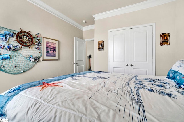 bedroom with ornamental molding and a closet