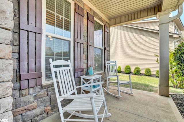 view of patio featuring a porch