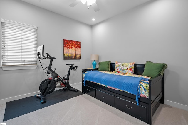 bedroom featuring ceiling fan, baseboards, and carpet floors