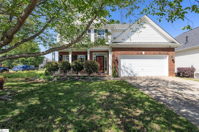 traditional-style home featuring a front lawn, driveway, an attached garage, a porch, and brick siding