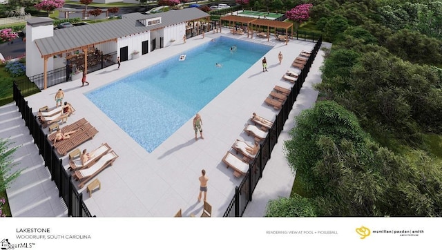 outdoor pool featuring a patio and fence