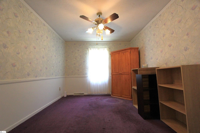 108 Dill Dr, Piedmont, SC 29673 - interior space with crown molding, wallpapered walls, baseboards, dark colored carpet, and visible vents