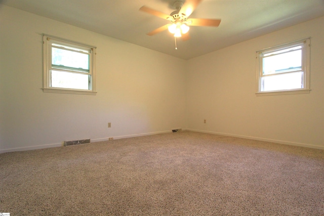 108 Dill Dr, Piedmont, SC 29673 - carpeted spare room featuring visible vents, baseboards, a wealth of natural light, and ceiling fan