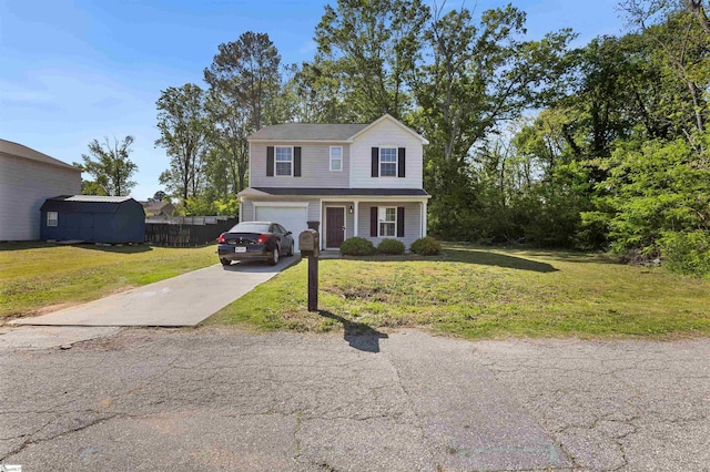 126 Rubin Ave, Anderson, SC 29624 - traditional-style house with a garage, fence, a front yard, and concrete driveway
