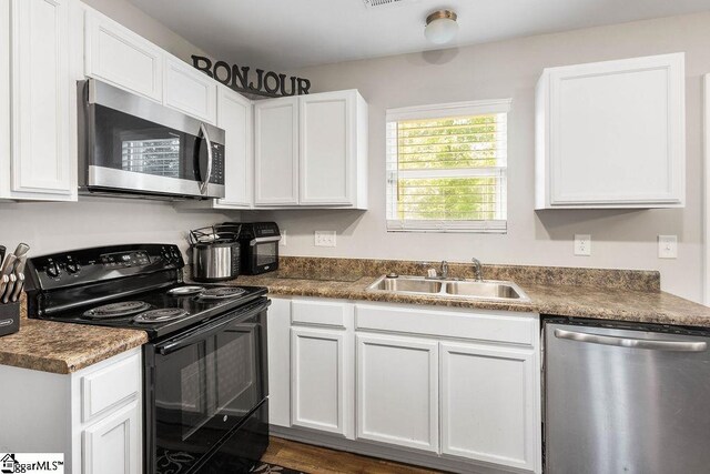 126 Rubin Ave, Anderson, SC 29624 - kitchen with white cabinets, appliances with stainless steel finishes, and a sink