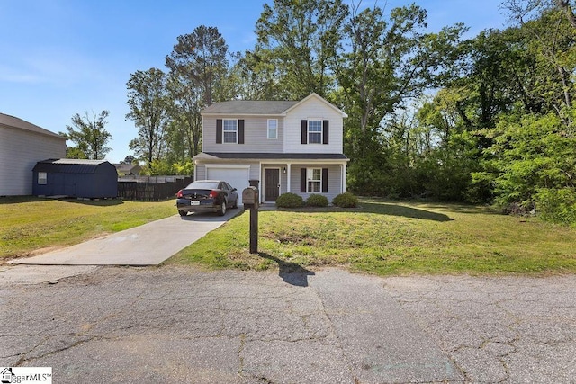126 Rubin Ave, Anderson, SC 29624 - traditional-style house with an attached garage, driveway, a front lawn, and fence
