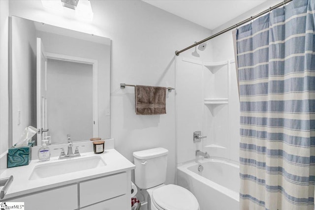 full bath featuring toilet, vanity, and shower / bathtub combination with curtain