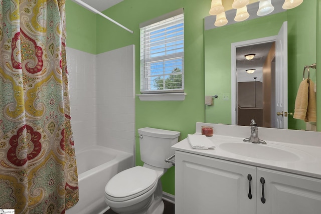 full bathroom with shower / bath combo with shower curtain, vanity, and toilet