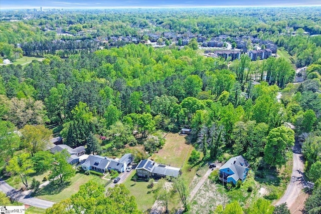 bird's eye view with a view of trees
