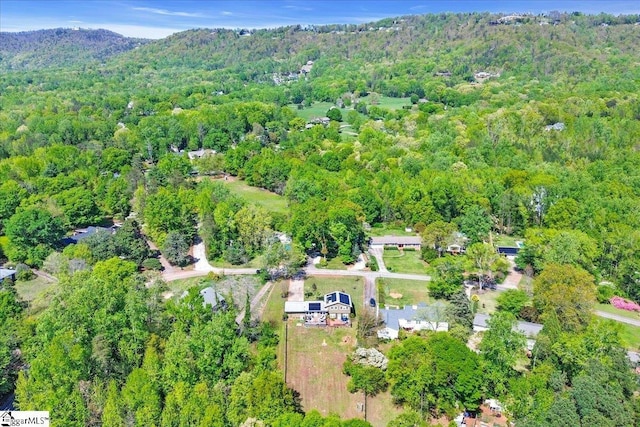aerial view with a wooded view