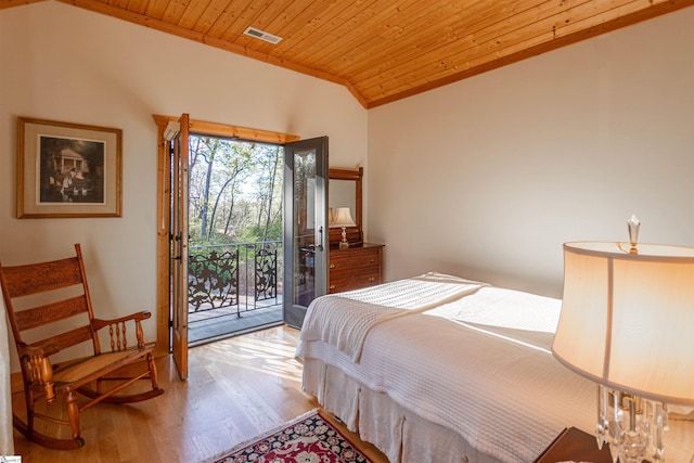 bedroom with vaulted ceiling, light wood-style flooring, wooden ceiling, access to outside, and visible vents