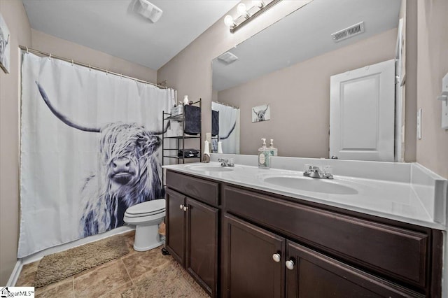 224 Hillendale Way, Pelzer, SC 29669 - bathroom with toilet, a sink, visible vents, and double vanity
