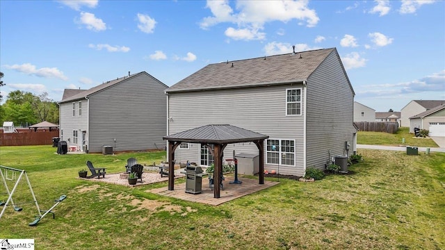 224 Hillendale Way, Pelzer, SC 29669 - rear view of property featuring a gazebo, a fire pit, fence, a patio area, and a yard