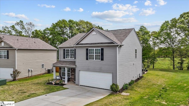 224 Hillendale Way, Pelzer, SC 29669 - view of front of home featuring central AC unit, a front lawn, driveway, a garage, and roof with shingles