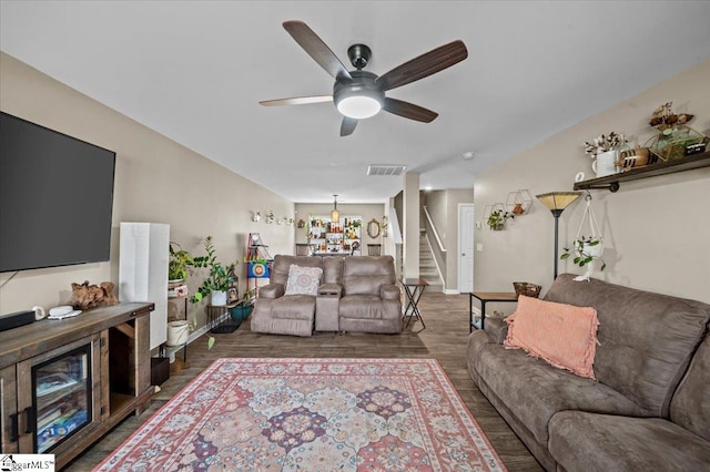 224 Hillendale Way, Pelzer, SC 29669 - living area with wood finished floors, baseboards, a ceiling fan, and visible vents