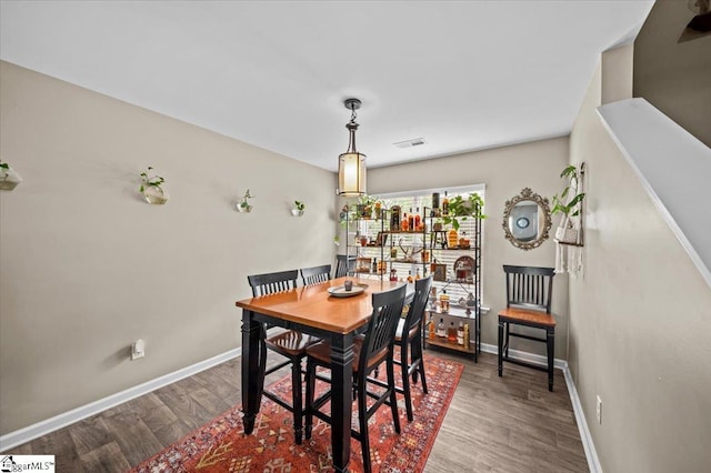 224 Hillendale Way, Pelzer, SC 29669 - dining area with baseboards, wood finished floors, and visible vents