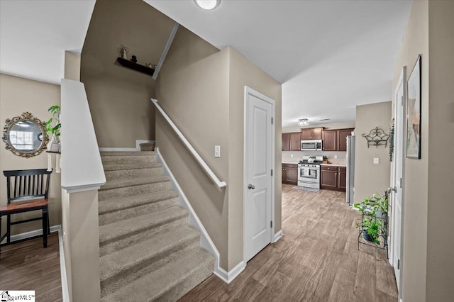 224 Hillendale Way, Pelzer, SC 29669 - staircase featuring baseboards and wood finished floors