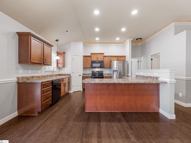 kitchen featuring a center island, a sink, black appliances, baseboards, and visible vents