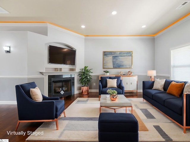 living room featuring recessed lighting, wood finished floors, and visible vents