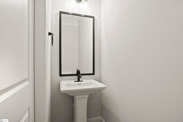 bathroom with crown molding