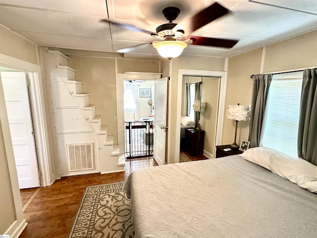 17920 Asheveille Hwy, Campobello, SC 29322 - bedroom with a ceiling fan, baseboards, visible vents, and wood finished floors