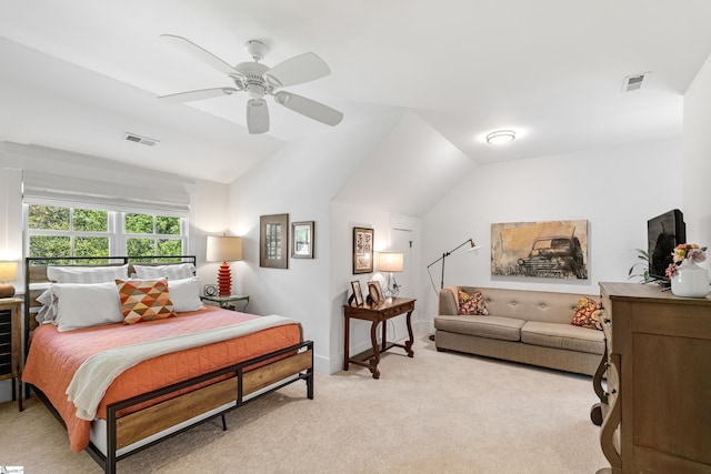 bedroom featuring lofted ceiling, light carpet, a ceiling fan, and visible vents