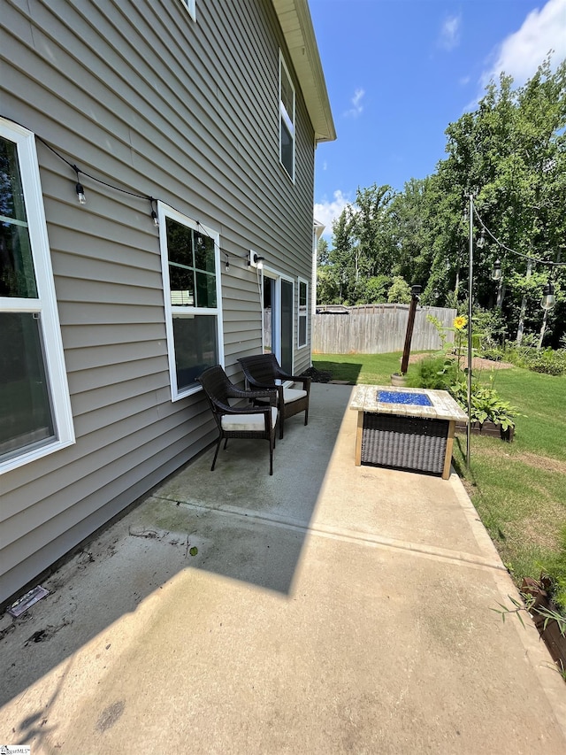 view of patio / terrace with fence