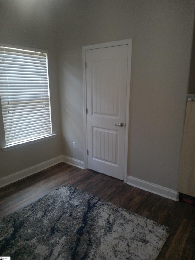 504 Airdale Ln, Simpsonville, SC 29680 - spare room featuring baseboards and wood finished floors