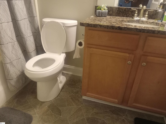 504 Airdale Ln, Simpsonville, SC 29680 - full bathroom with baseboards, toilet, vanity, and tile patterned floors