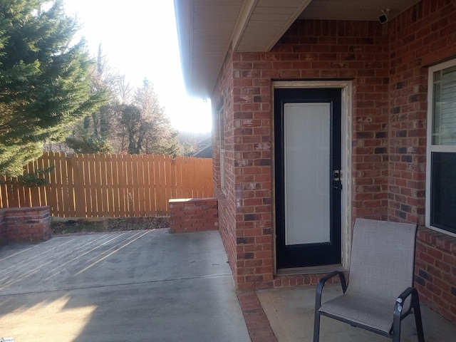 504 Airdale Ln, Simpsonville, SC 29680 - property entrance featuring brick siding, fence, and a patio
