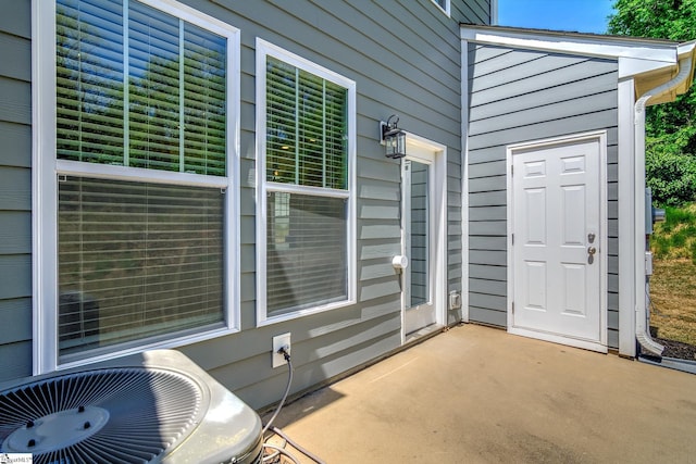 property entrance featuring central air condition unit