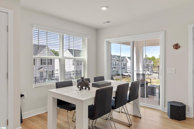 12 Hargrove Ct, Greenville, SC 29617 - dining room featuring baseboards, visible vents, and light wood-style flooring