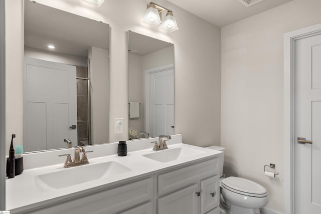 12 Hargrove Ct, Greenville, SC 29617 - full bathroom featuring toilet, a shower with door, a sink, and double vanity